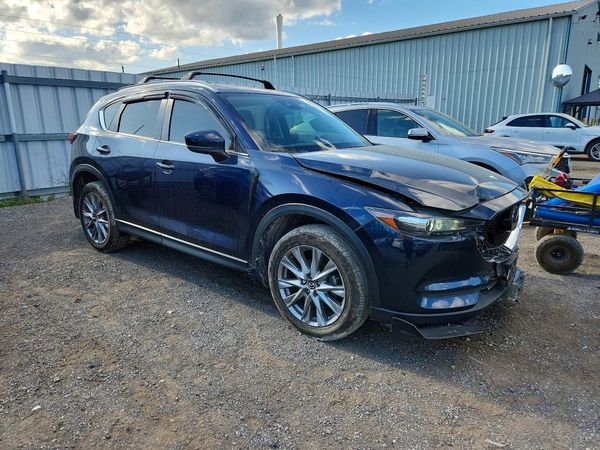 2021 MAZDA CX-5 Touring — Passenger 3/4