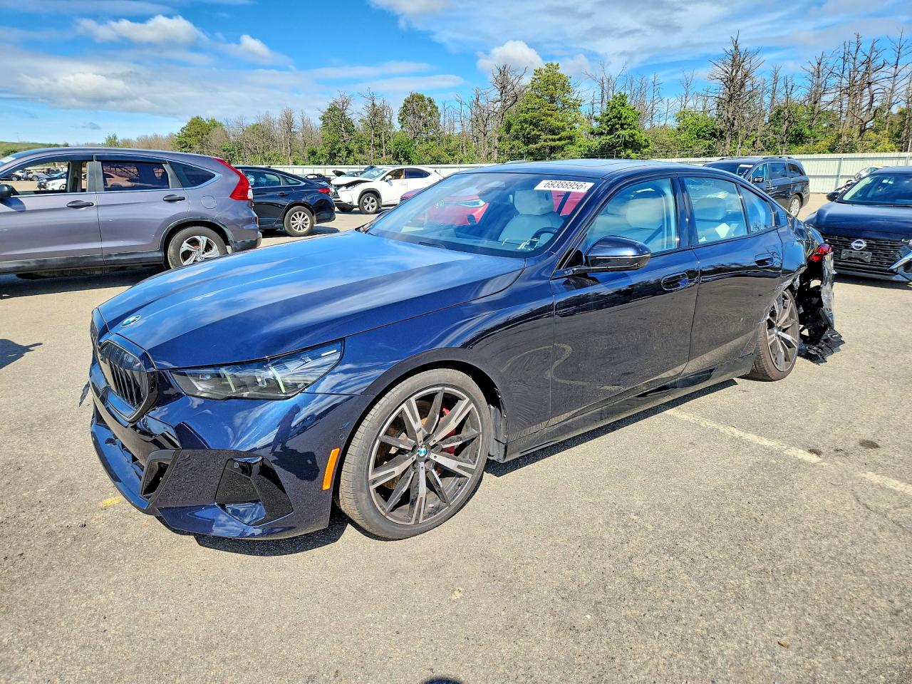 2025 BMW 5 SERIES xDrive — Front 3/4