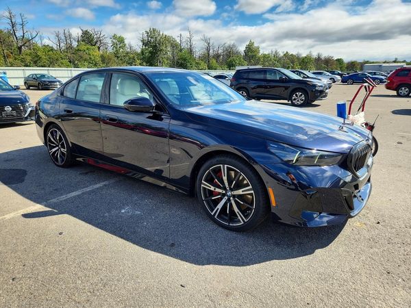 2025 BMW 5 SERIES xDrive — Passenger 3/4
