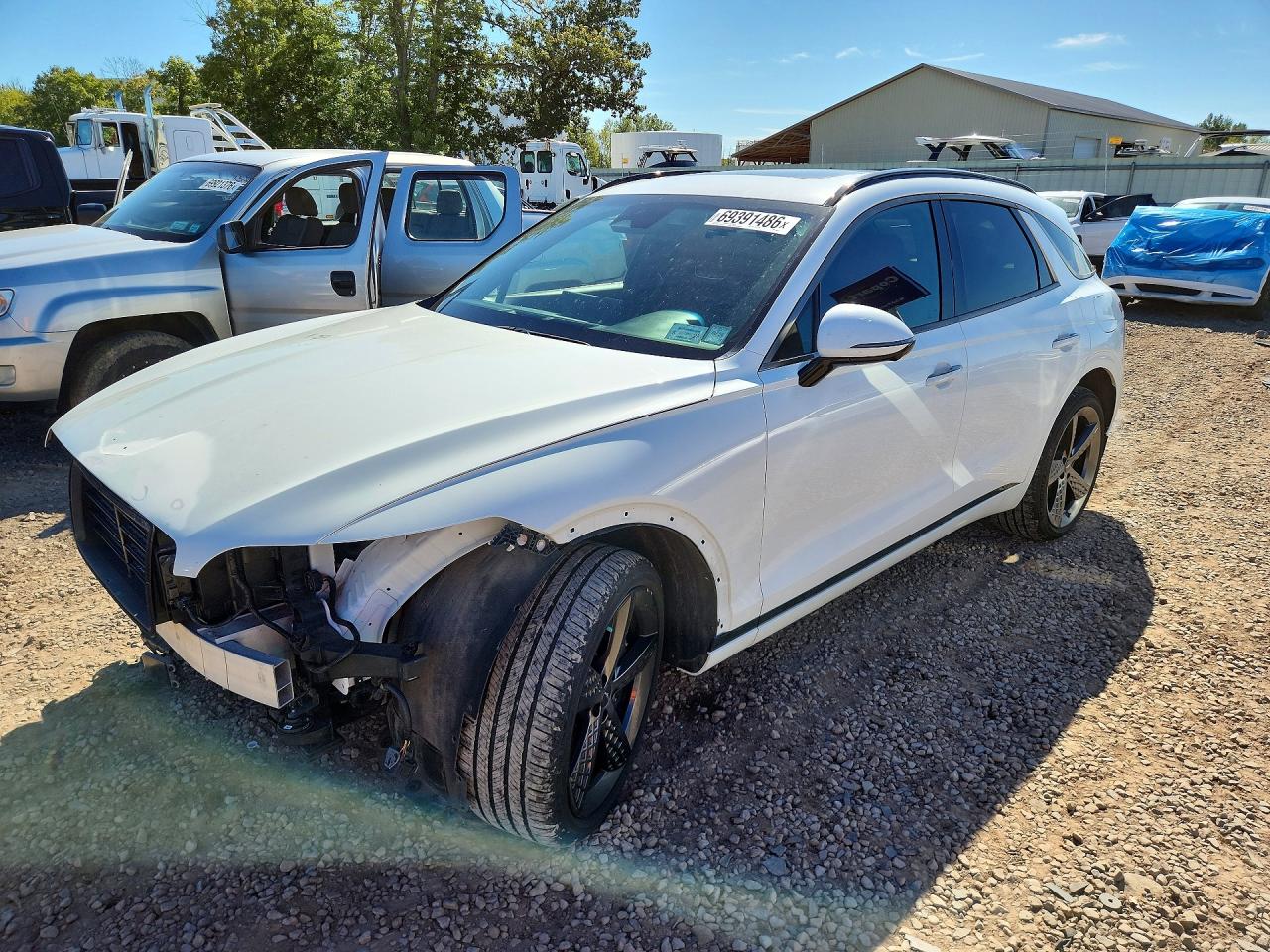2024 GENESIS GV70 — Front 3/4