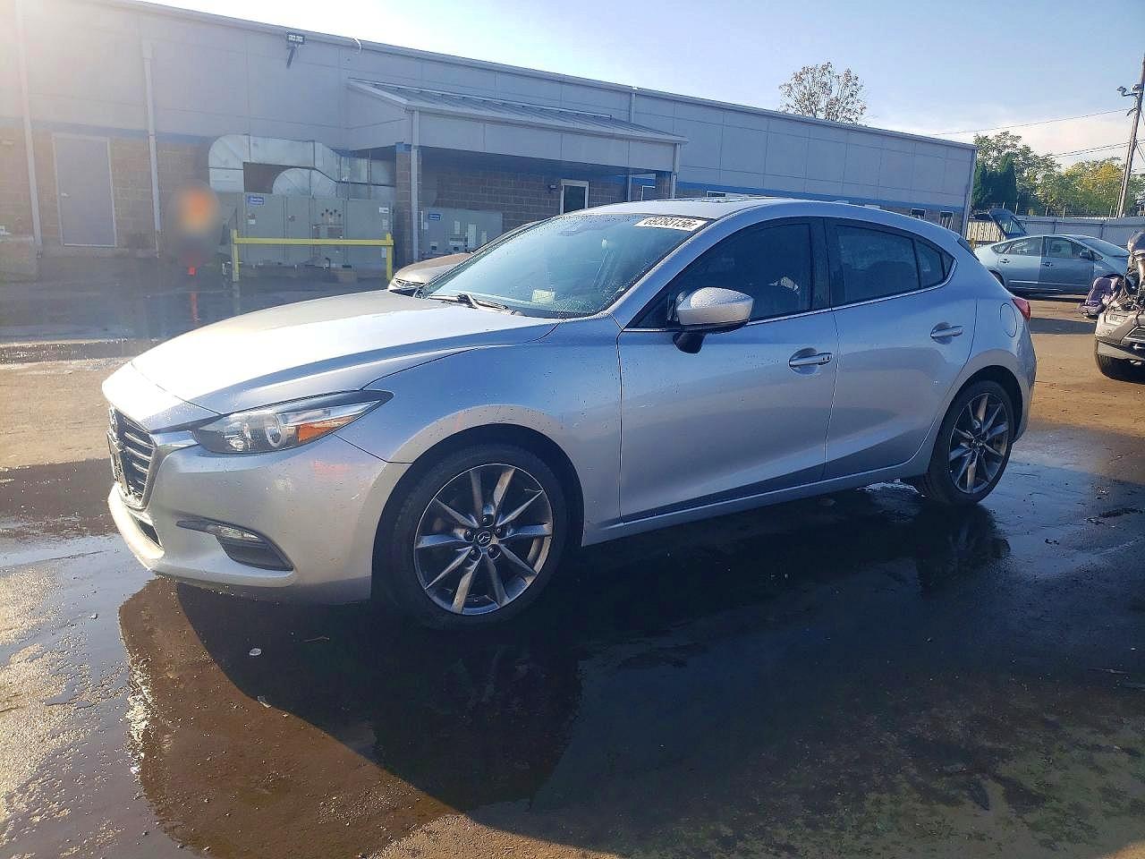 2018 MAZDA 3 Touring — Front 3/4