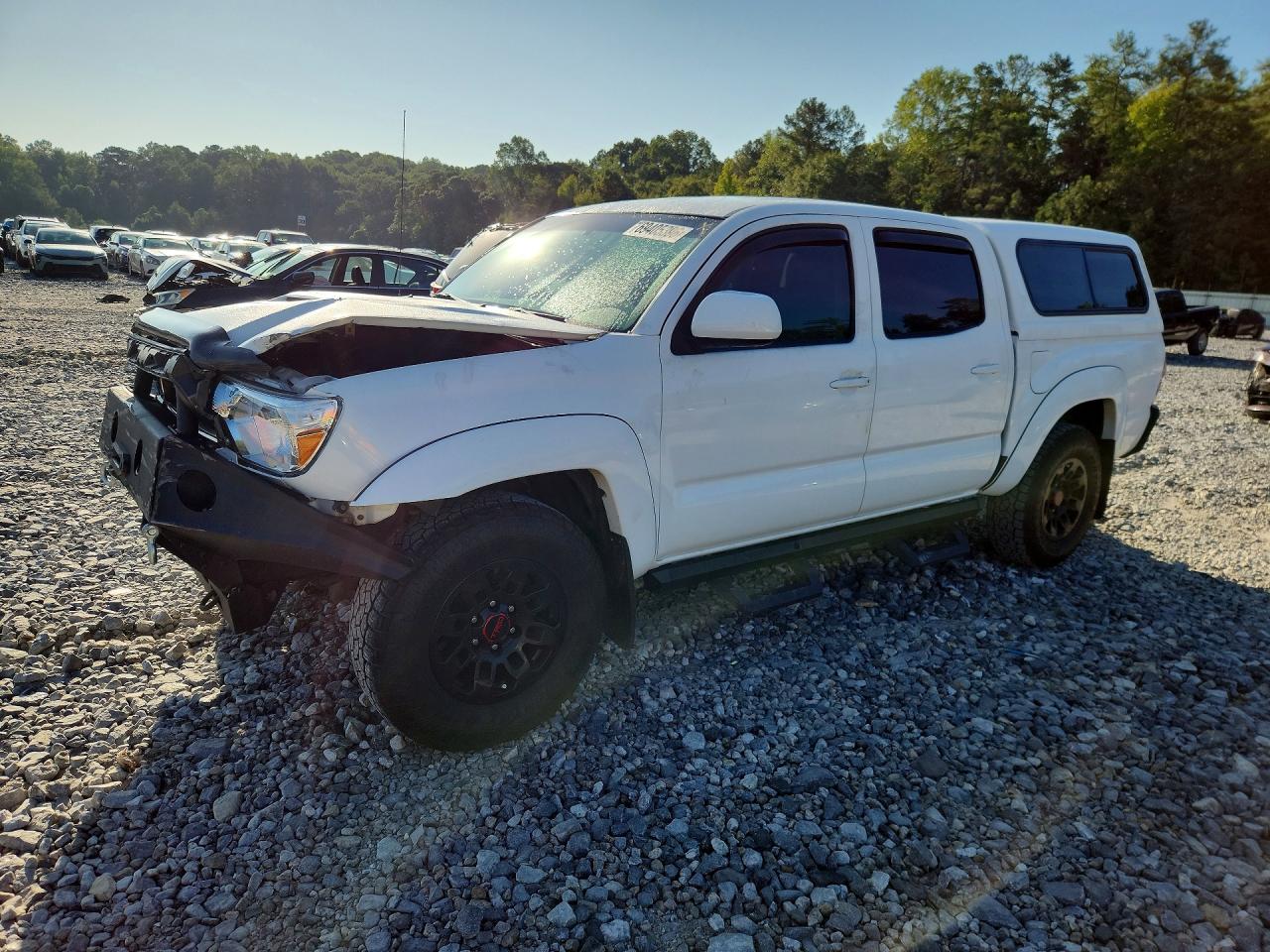 2013 TOYOTA TACOMA Delux — Front 3/4