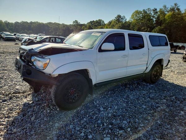 2013 TOYOTA TACOMA Delux — Front 3/4