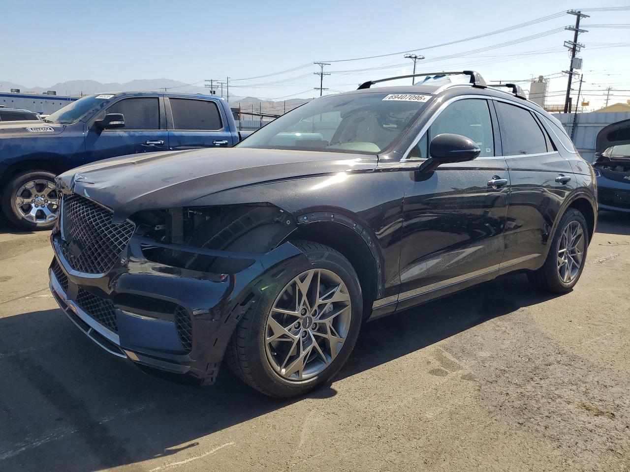 2023 GENESIS GV70 — Front 3/4