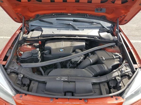 2014 BMW X1 sDrive 28i — Engine bay