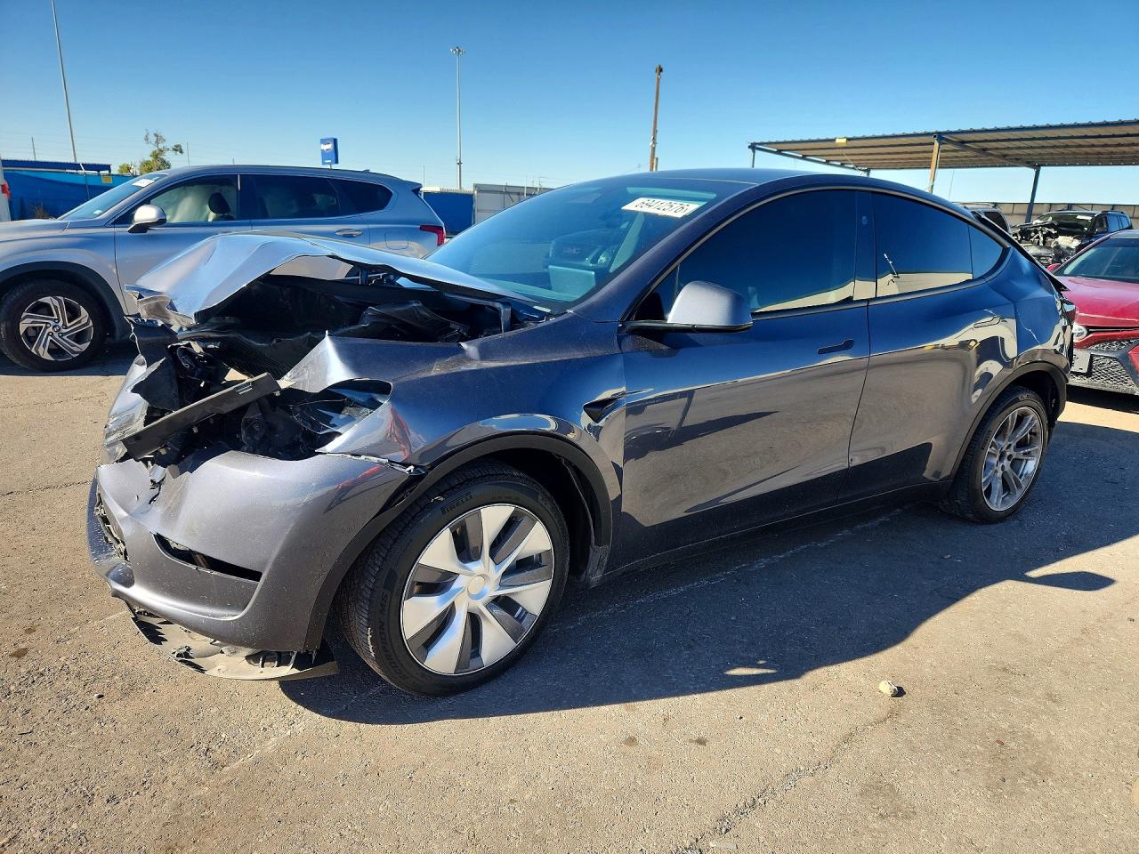 2023 TESLA MODEL Y — Front 3/4
