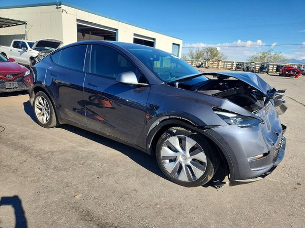 2023 TESLA MODEL Y — Passenger 3/4
