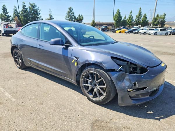 2023 TESLA MODEL 3 — Passenger 3/4