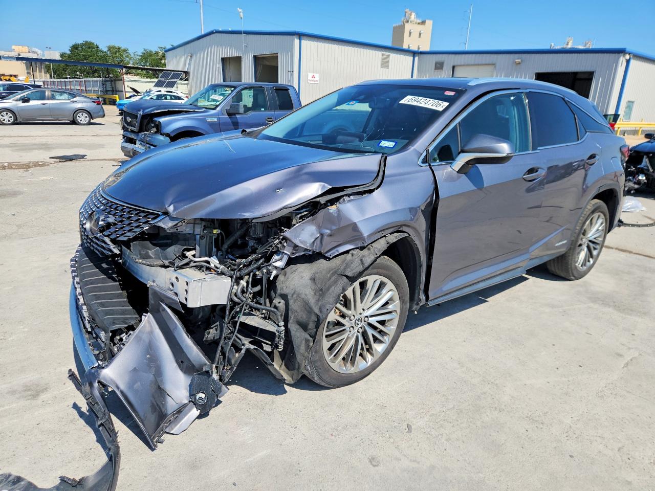 2020 LEXUS RX 450h Luxury — Front 3/4
