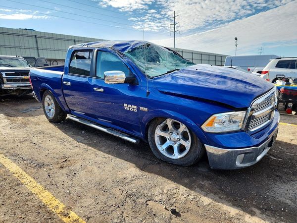 2016 RAM 1500 Laramie — Passenger 3/4