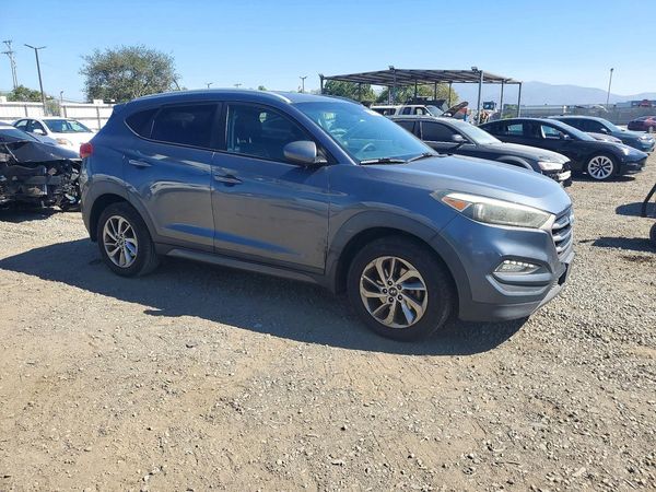 2016 HYUNDAI TUCSON — Passenger 3/4