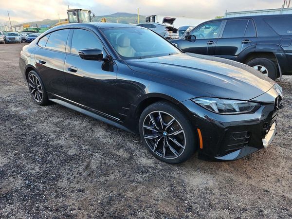 2025 BMW I4 — Passenger 3/4
