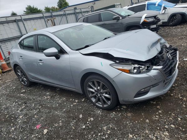 2018 MAZDA 3 Touring — Passenger 3/4