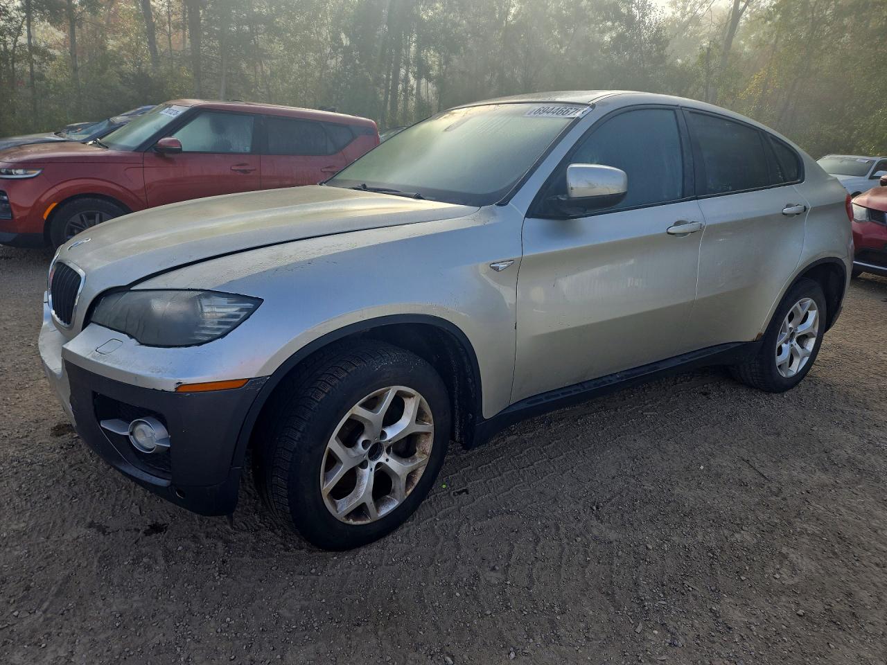 2012 BMW X6 xDrive35i — Front 3/4