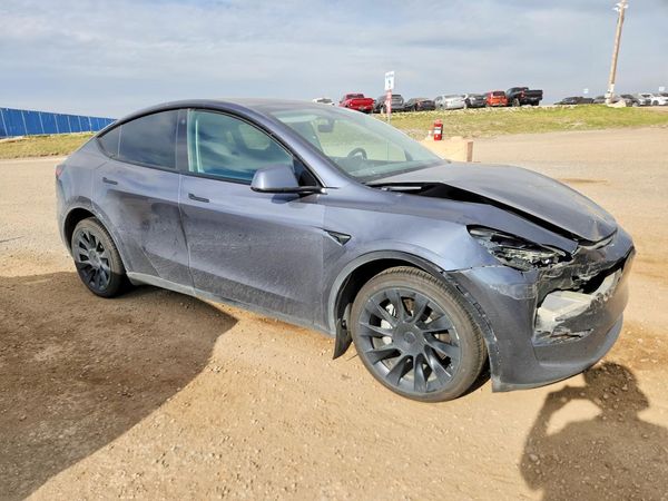 2023 TESLA MODEL Y — Passenger 3/4