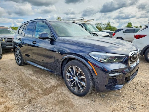 2022 BMW X5 xDrive45e — Passenger 3/4