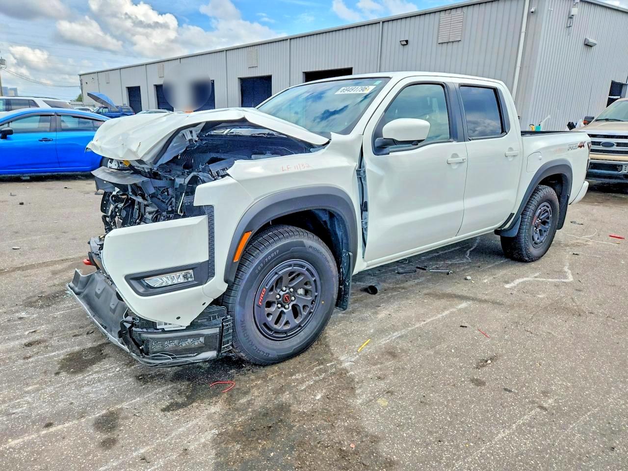 2026 NISSAN FRONTIER — Front 3/4