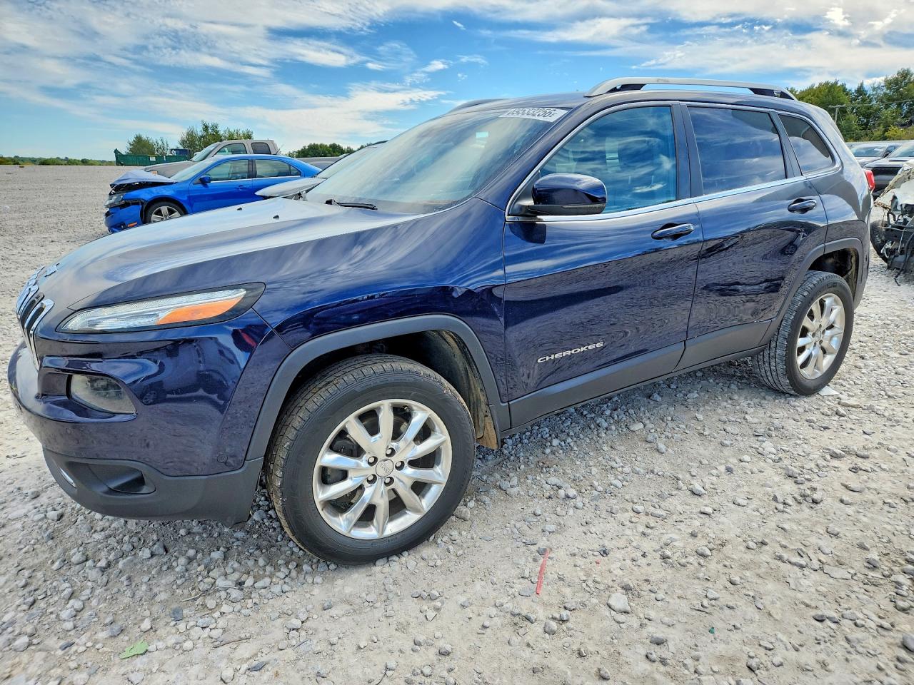 2014 JEEP CHEROKEE Limited — Front 3/4