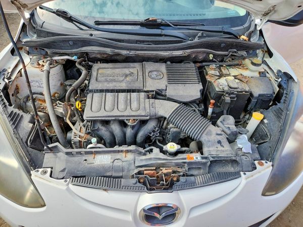 2012 MAZDA 2 Sport/GX — Engine bay