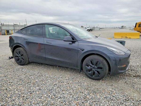 2025 TESLA MODEL Y — Passenger 3/4
