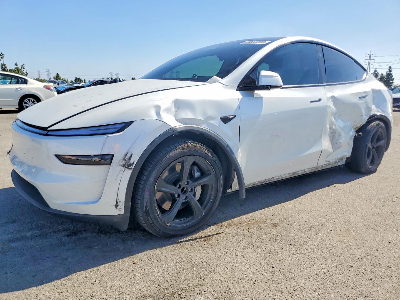 2026 TESLA MODEL Y — Front 3/4