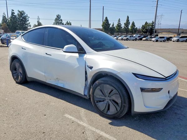 2026 TESLA MODEL Y — Passenger 3/4
