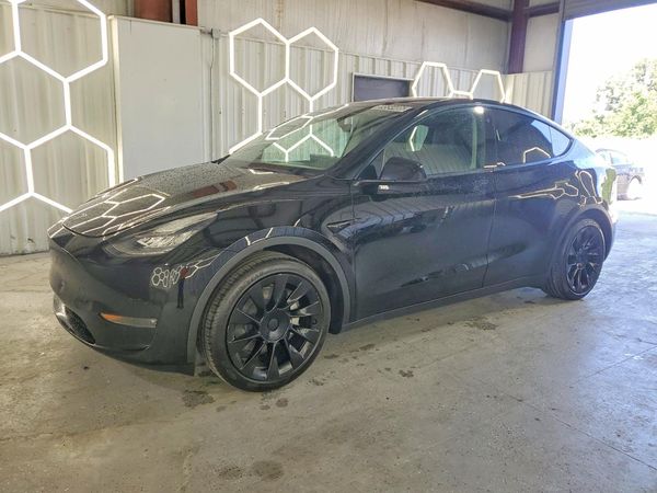 2023 TESLA MODEL Y — DSFA — Front 3/4