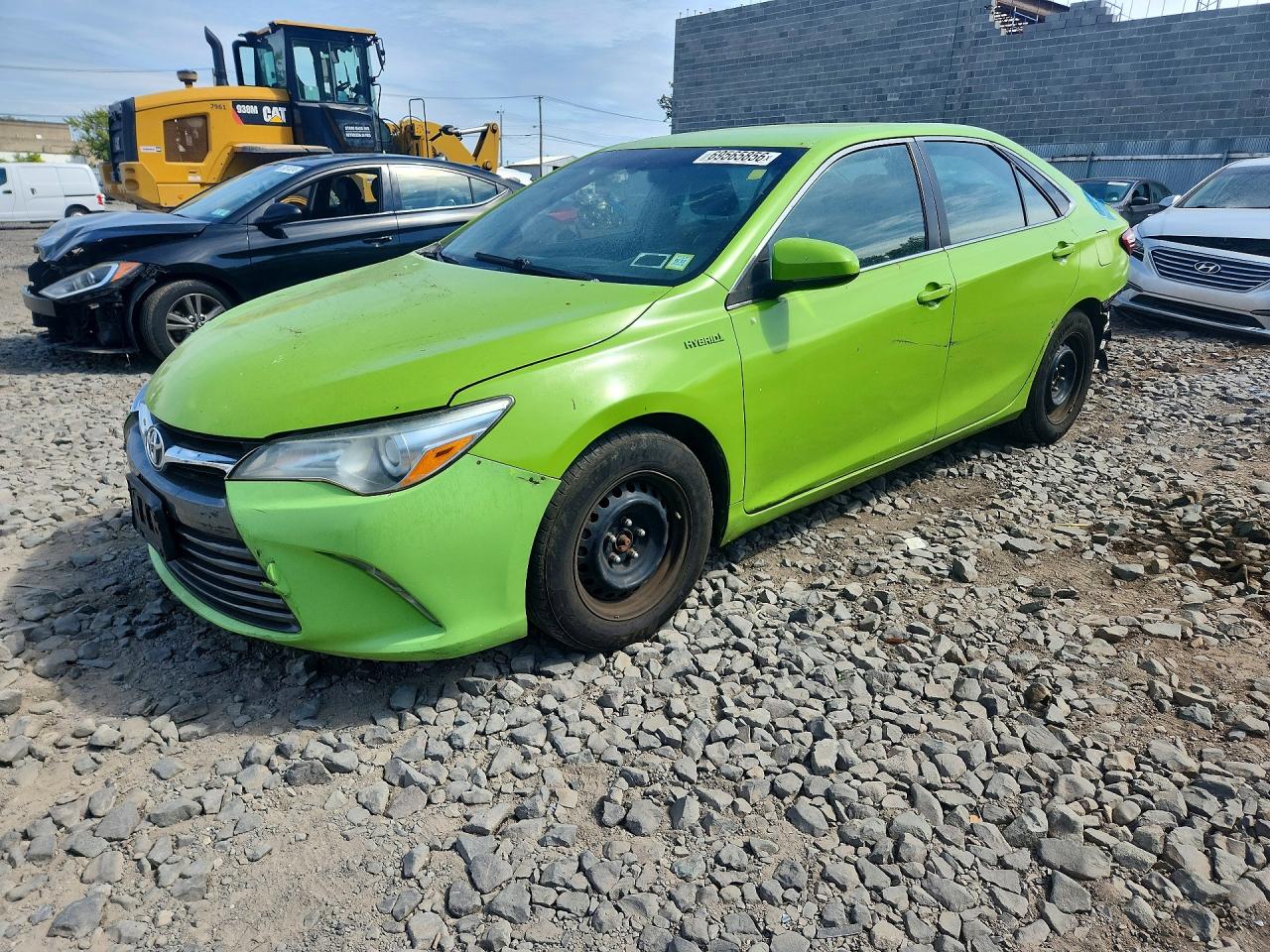 2015 TOYOTA CAMRY SOLA Hybrid — Front 3/4