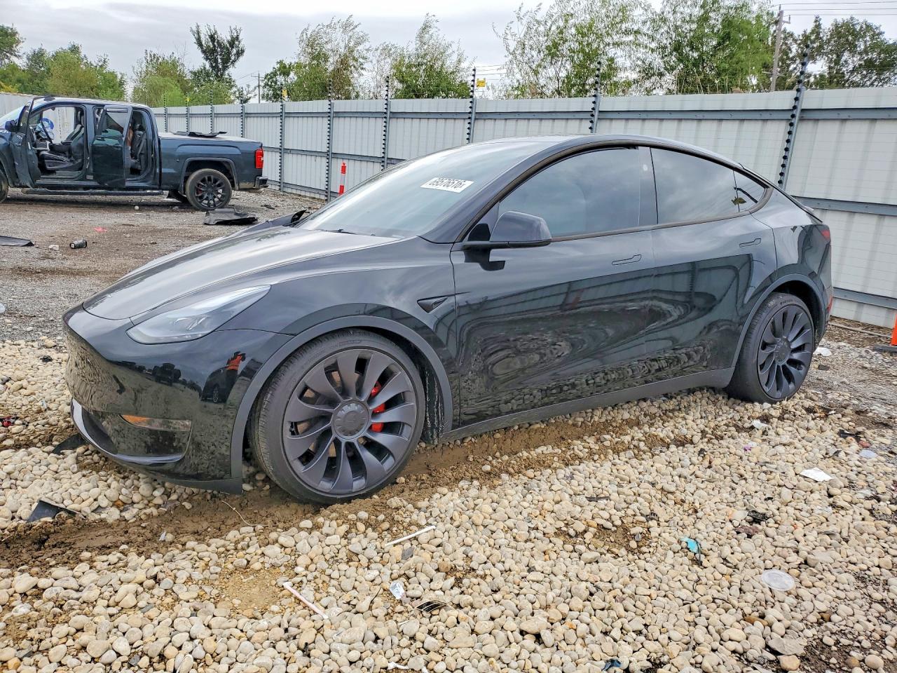 2024 TESLA MODEL Y — Front 3/4