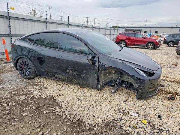 2024 TESLA MODEL Y — Passenger 3/4