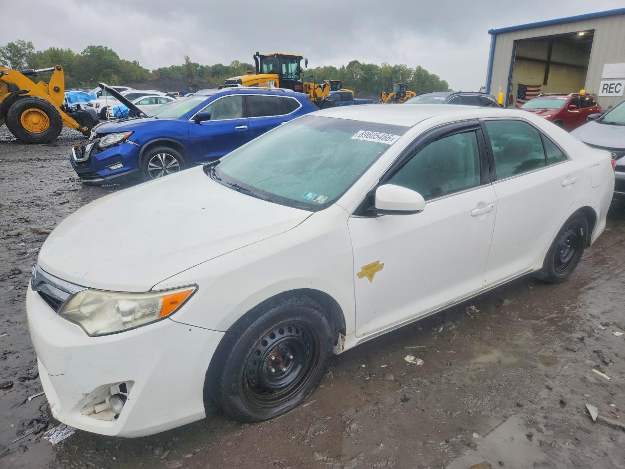 2014 TOYOTA CAMRY SOLA Hybrid — Front 3/4