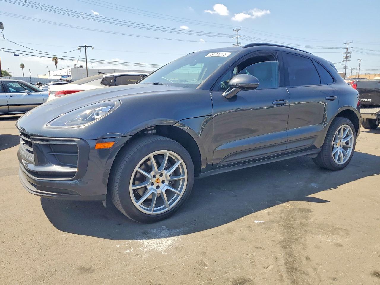 2024 PORSCHE MACAN — Front 3/4