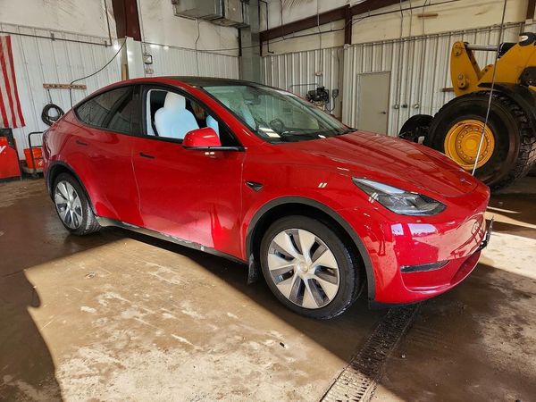 2023 TESLA MODEL Y — Passenger 3/4