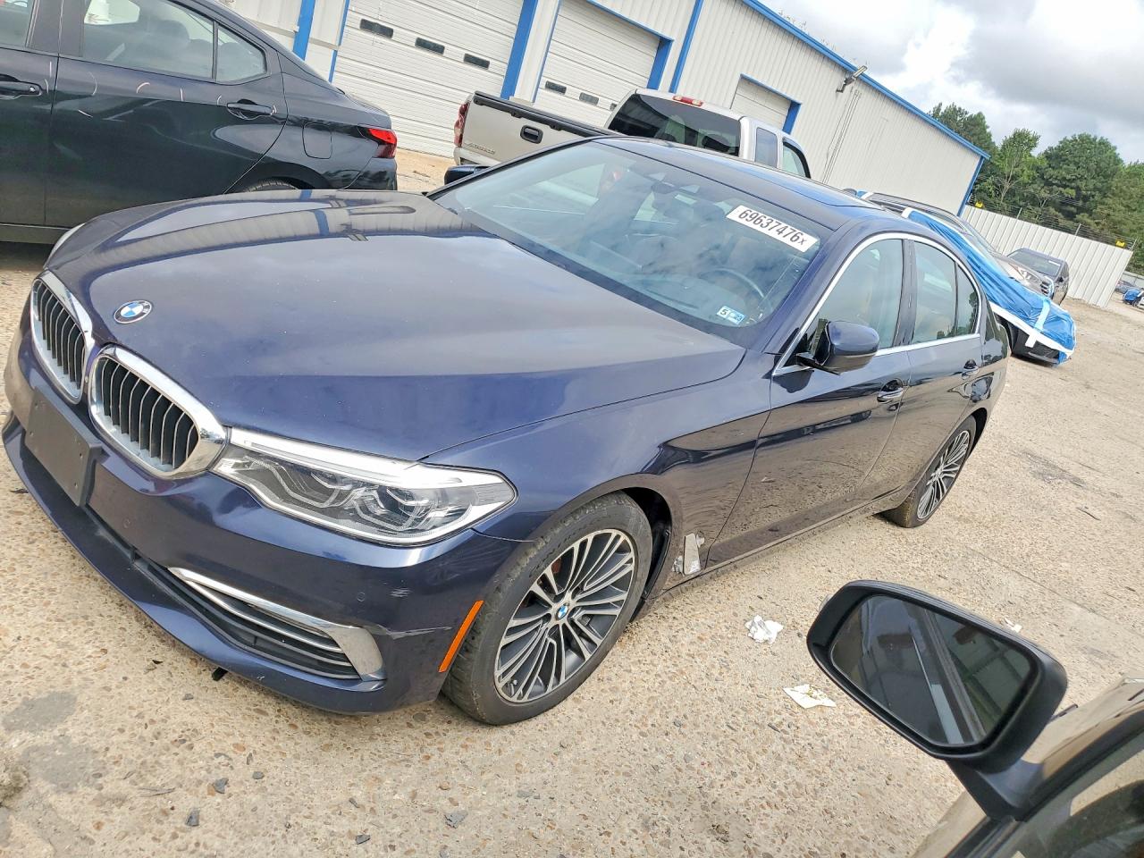 2017 BMW 5 SERIES xDrive — Front 3/4