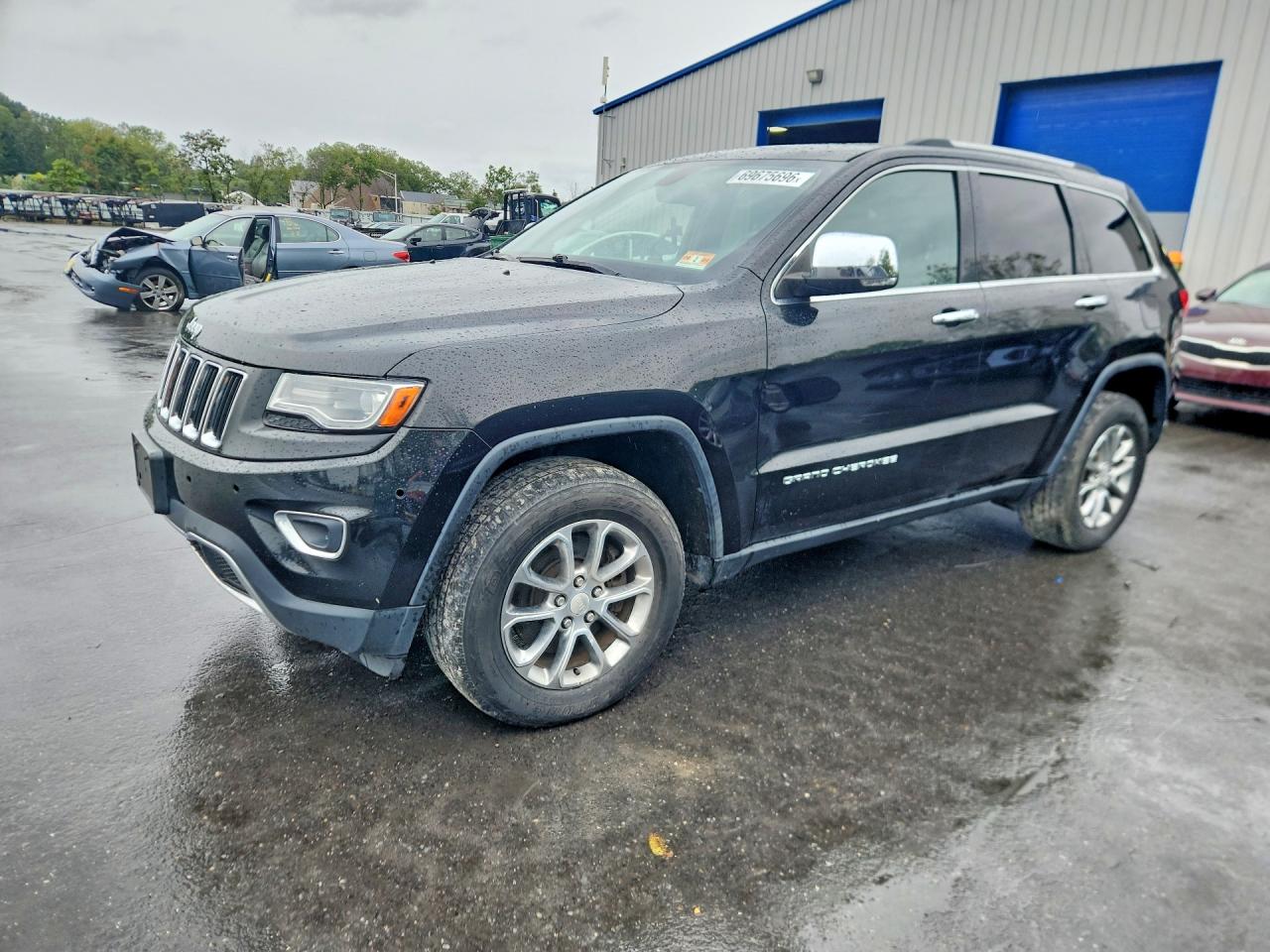 2014 JEEP CHEROKEE Limited — Front 3/4
