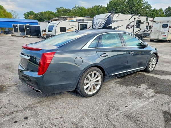 2014 CADILLAC XTS — PSRA
