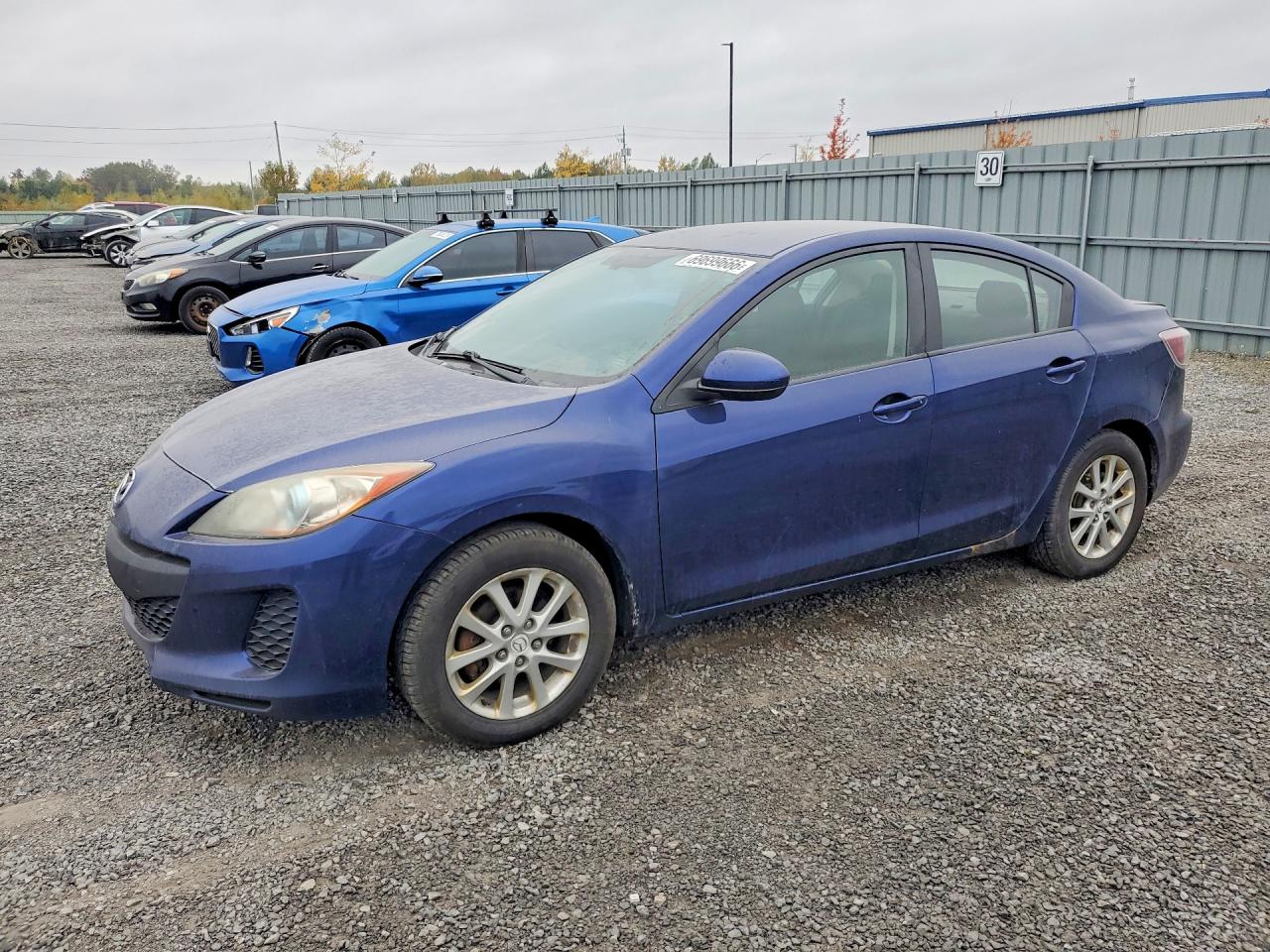 2012 MAZDA 3 Touring/GS — Front 3/4