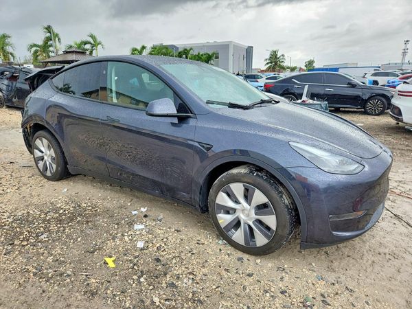 2024 TESLA MODEL Y — Passenger 3/4