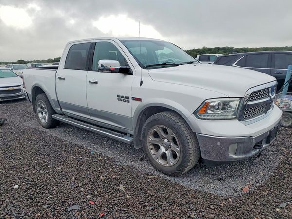 2014 RAM 1500 Laramie — Passenger 3/4