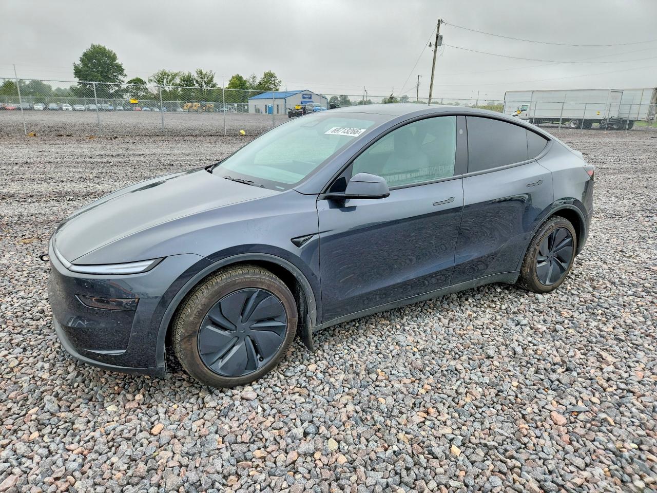 2026 TESLA MODEL Y — Front 3/4