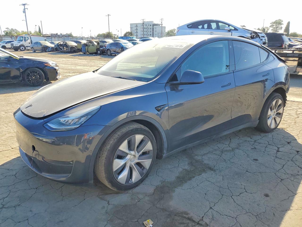 2023 TESLA MODEL Y — Front 3/4