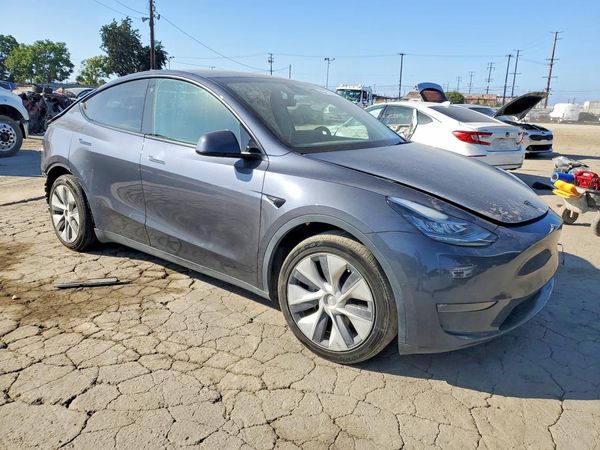 2023 TESLA MODEL Y — Passenger 3/4