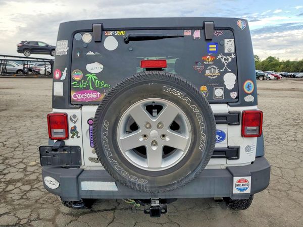 2015 JEEP WRANGLER UNLIMITED Sport — DIRR