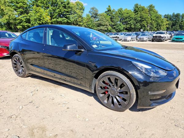 2023 TESLA MODEL 3 — Passenger 3/4
