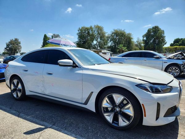 2025 BMW I4 — Passenger 3/4