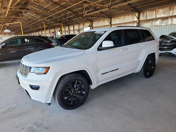 2019 JEEP GRAND CHEROKEE — Front 3/4