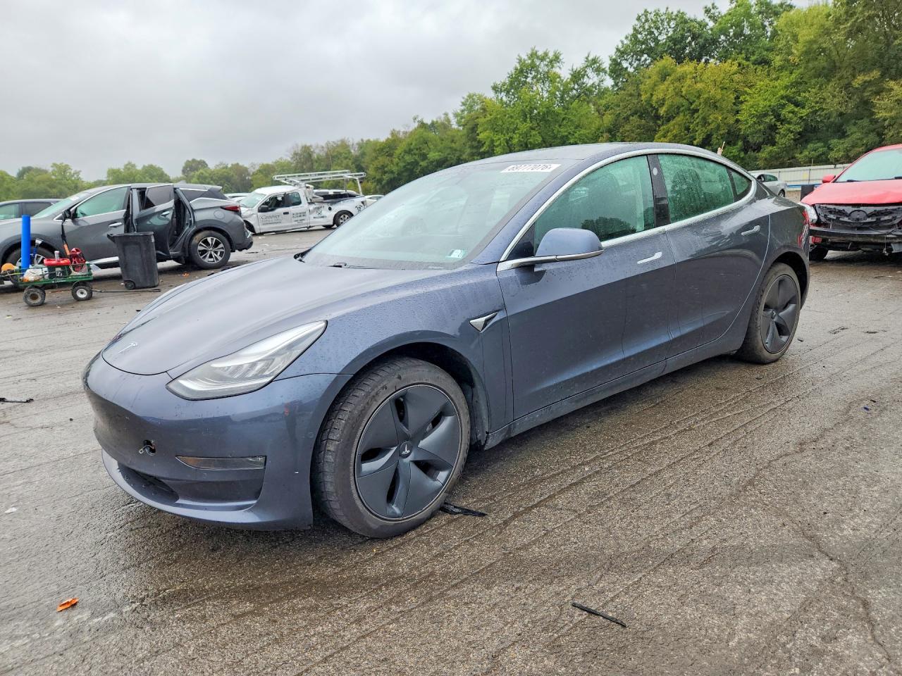 2020 TESLA MODEL 3 — Front 3/4
