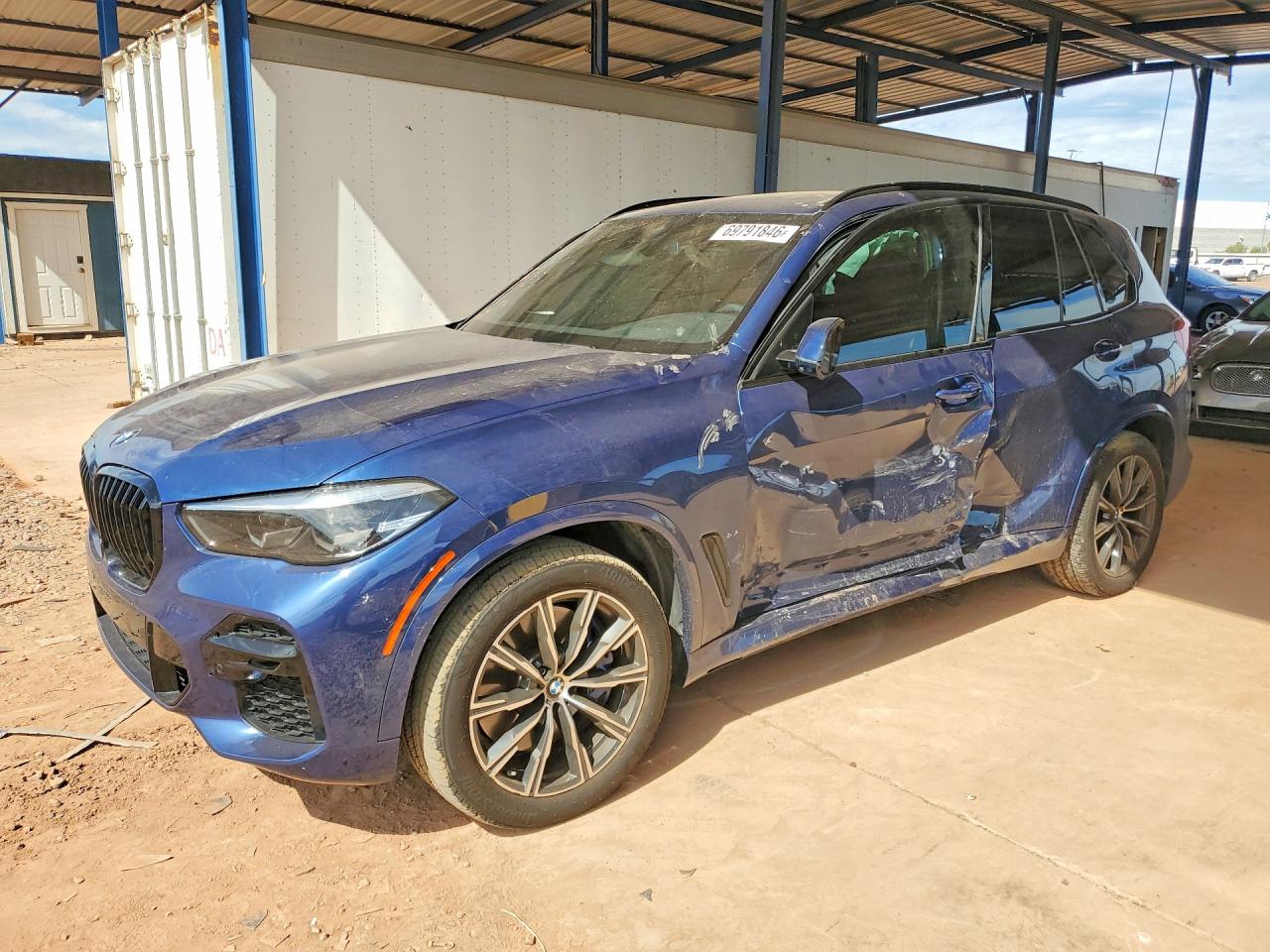 2022 BMW X5 M50i — Front 3/4