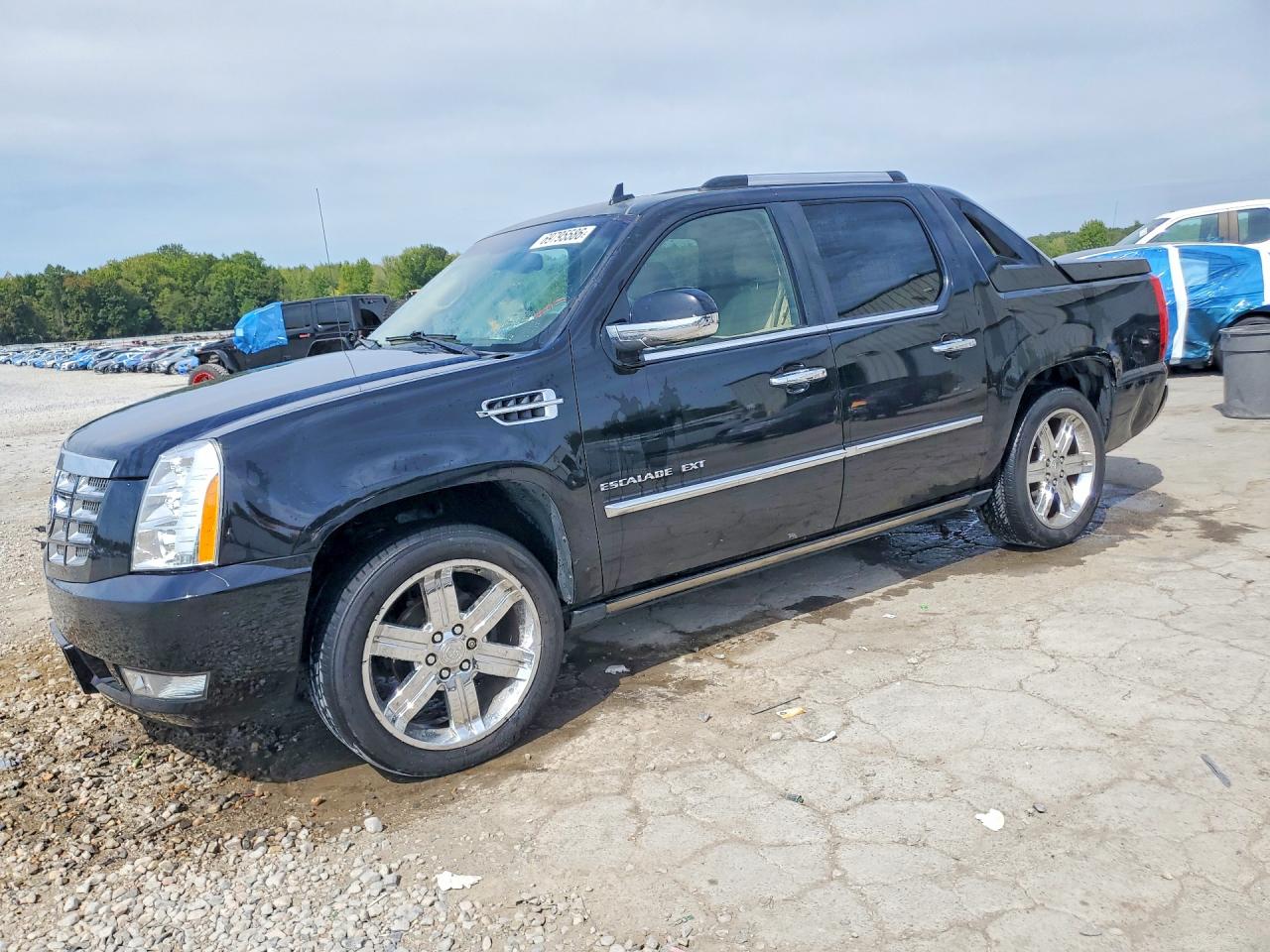 2012 CADILLAC ESCALADE EXT Premium — Front 3/4