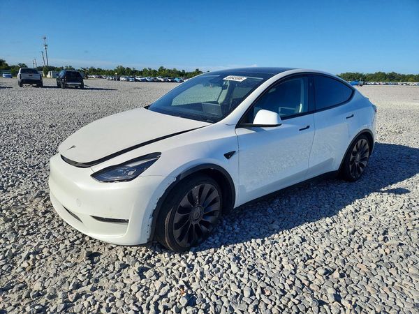 2025 TESLA MODEL Y — Front 3/4